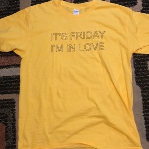 Brand New. Never Worn. Yellow graphic Tee.